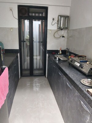 Kitchen in 1 BHK Apartment at Runwal My City, Dombivli East – for Rent