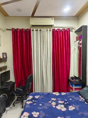 Bedroom in 2 BHK Apartment at Happy Home Sarvodaya Valley, Dombivli East – for Rent