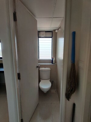 Bathroom in 1 BHK Apartment at Runwal Gardens, Dombivli East – for Rent