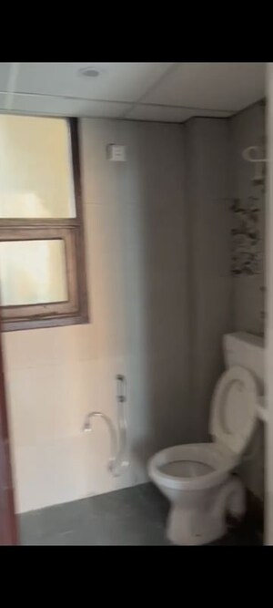 Bathroom in 4 BHK Apartment at Sanchar Nest Palm Heights, Wave City – for Rent