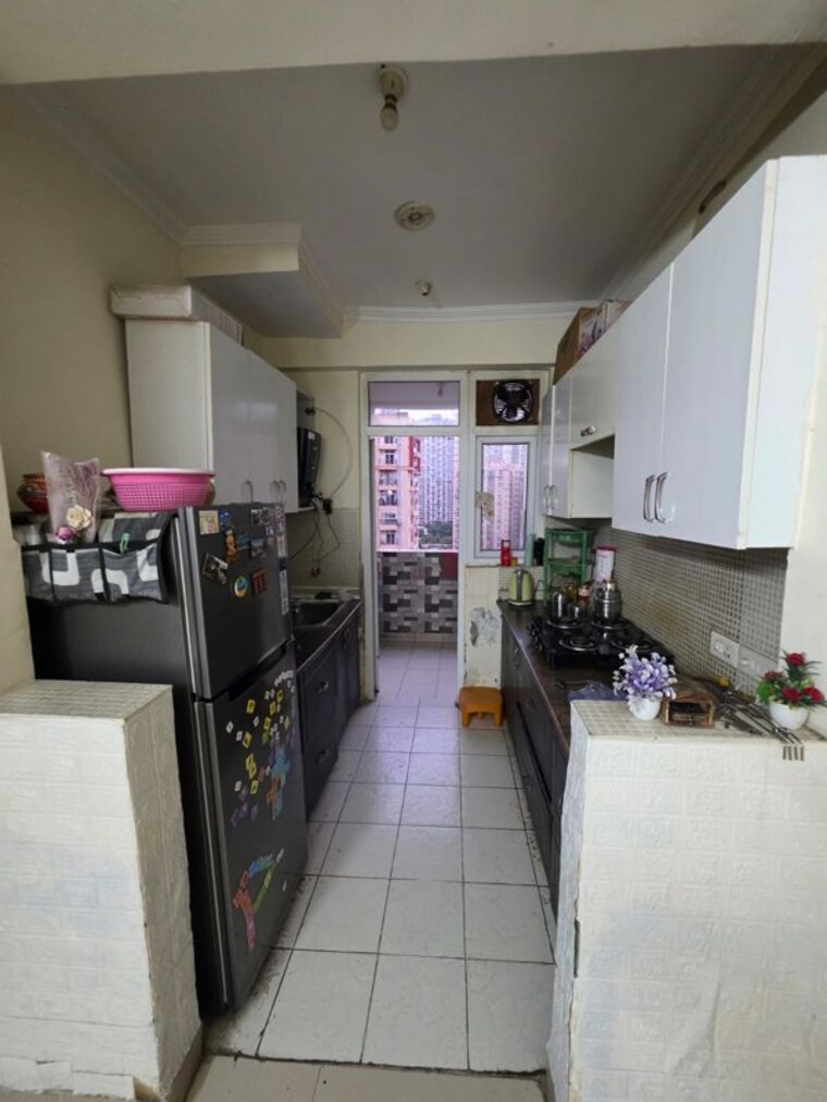 Kitchen, amrapali-silicon-city 2.5 Bedroom 1180 Sq.Ft. Apartment In Sector 76 Noida 10411565