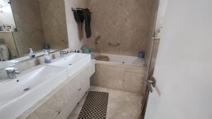 Bathroom in 4 BHK Apartment at Emaar The Palm Drive-Palm Studios, Sector 66 – for Rent