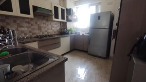 Kitchen in 4 BHK Apartment at Emaar The Palm Drive-Palm Studios, Sector 66 – for Rent