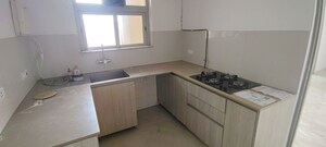 Kitchen in 2 BHK Apartment at Hiranandani Estate Rodas Enclave, Ghodbunder Road – for Sale
