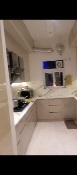Kitchen in 4 BHK Apartment at Puri Aanandvilas, Sector 81 – for Sale