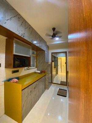 Kitchen in 3 BHK Apartment at Omkar Alta Monte, Malad East – for Rent