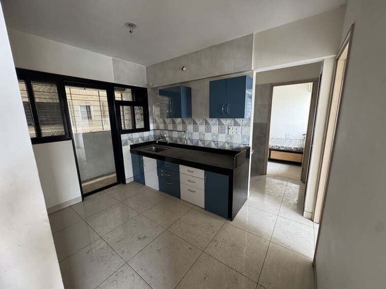 Kitchen/pantry, magarpatta-nova 2 Bedroom 900 Sq.Ft. Apartment In Mundhwa Pune 10411632