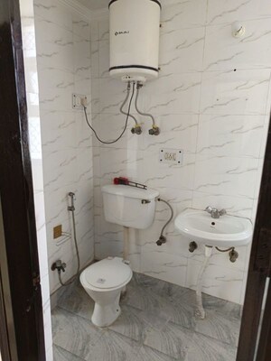 Bathroom in 4 BHK Apartment at Dwarka – for Rent
