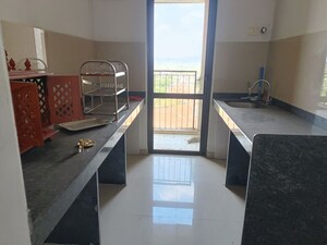 Kitchen in 1 BHK Apartment at Lodha Lakeshore Greens, Dombivli East – for Sale
