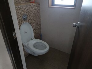 Bathroom in 1 BHK Apartment at Lodha Lakeshore Greens, Dombivli East – for Sale