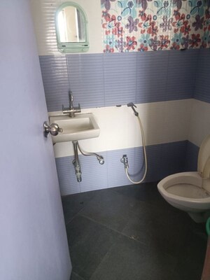 Bathroom in 3 BHK Apartment at Aundh Gaon – for Rent