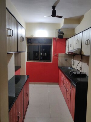 Kitchen in 2.5 BHK Apartment at Runwal Garden City, Balkum Pada – for Sale