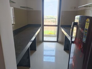 Kitchen in 1 BHK Apartment at Lodha Lakeshore Greens, Dombivli East – for Sale