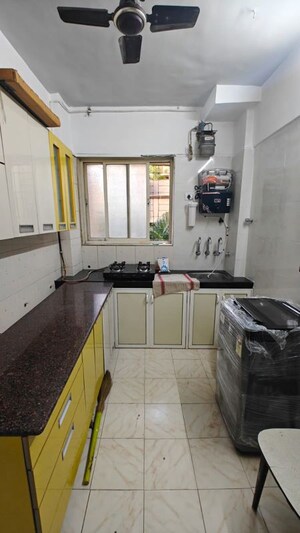 Kitchen in 2 BHK Apartment at Takshila CHS, Andheri East – for Rent