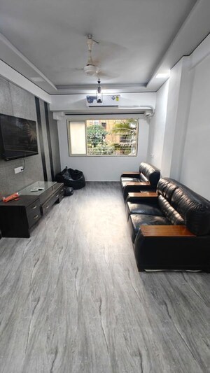Living Room in 2 BHK Apartment at Takshila CHS, Andheri East – for Rent