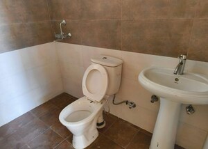 Bathroom in 3 BHK Apartment at SVP Gulmohur Garden, Raj Nagar Extension – for Rent