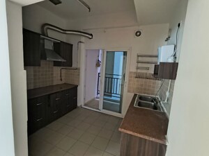 Kitchen in 2.5 BHK Apartment at Mahagun Moderne, Sector 78 – for Sale