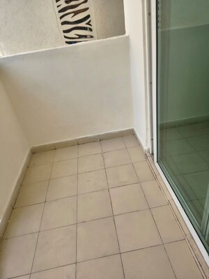 Balcony in 2.5 BHK Apartment at Mahagun Moderne, Sector 78 – for Sale