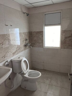 Bathroom in 3 BHK Apartment at JKG Palm Court, Sector 16c Greater Noida – for Sale