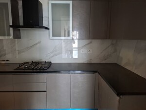 Kitchen in 3 BHK Apartment at Krisumi Waterfall Suites, Sector 36a – for Rent