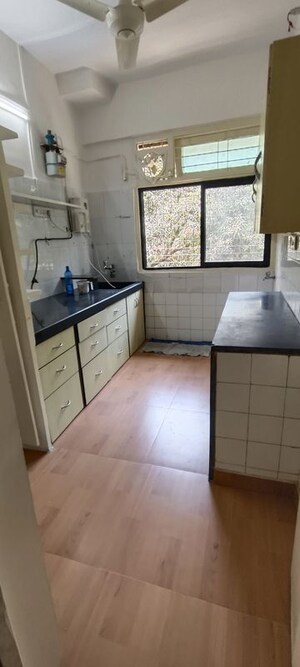 Kitchen in 1 BHK Apartment at Prabha Mandir CHS, Prabhadevi – for Rent