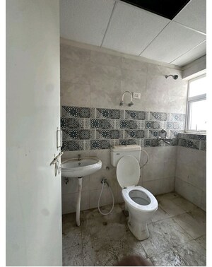 Bathroom in 1 BHK Apartment at Signature Global Golf Greens, Sector 79 – for Sale