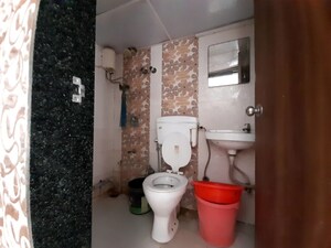 Bathroom in 1 RK Apartment at Royal Palms Garden View, Goregaon East – for Rent