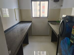 Kitchen in 1 BHK Apartment at Lodha Palava Downtown, Dombivli East – for Sale