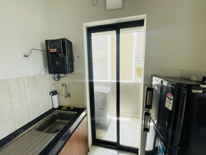 Kitchen in 2 BHK Apartment at Shapoorji Pallonji Sensorium, Hinjewadi – for Rent