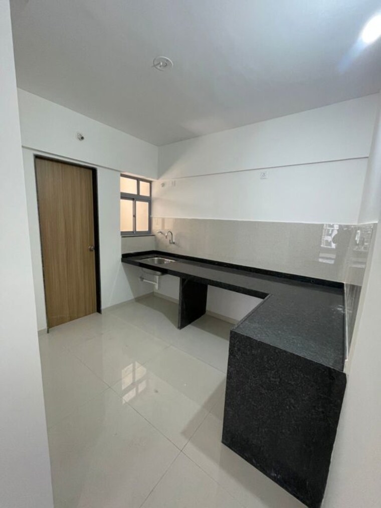 Kitchen, nivasa-enchante 2.5 Bedroom 900 Sq.Ft. Apartment In Lohgaon Pune 10412206