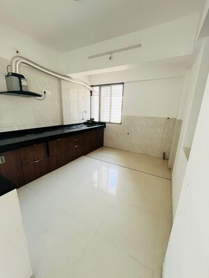 Kitchen in 3 BHK Apartment at Aryavart Star Altair, Bhugaon – for Rent