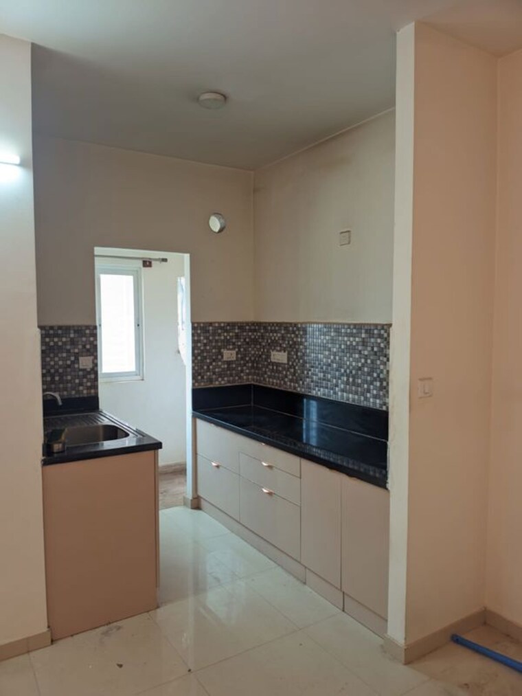 Kitchen, bren-northern-lights 2 Bedroom 602 Sq.Ft. Apartment In Jakkuru Bangalore 10412329