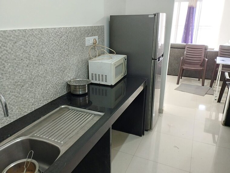 Kitchen, godrej-nurture-pune 2 Bedroom 850 Sq.Ft. Apartment In Mamurdi Pune 10412358