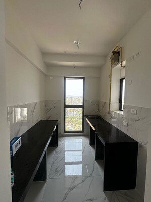 Kitchen in 2 BHK Apartment at Raymond Ten X Habitat, Pokhran Road No Two – for Rent