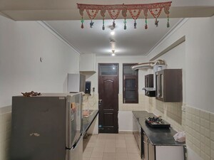 Kitchen in 3 BHK Apartment at Jaipuria Sunrise Green, Lohgarh – for Rent