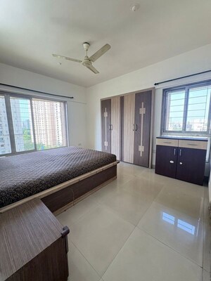 Living Room in 2 BHK Apartment at Kanakia Spaces Niharika, Manpada – for Rent