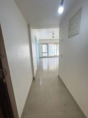 Building Lobby in 2 BHK Apartment at Kanakia Spaces Niharika, Manpada – for Rent