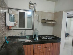 Kitchen in 1 BHK Apartment at G K Roseland Residency, Pimple Saudagar – for Rent