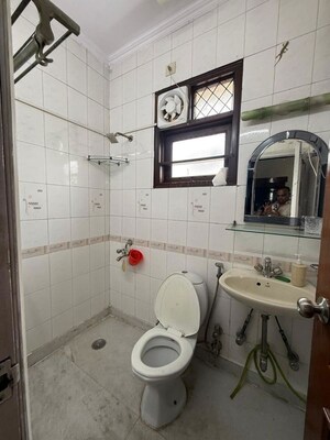 Bathroom in 2 BHK Builder Floor at Kalkaji – for Rent