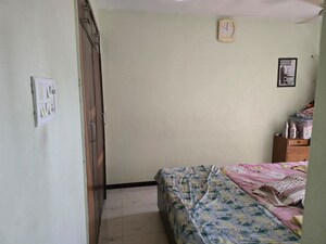Bedroom in 2 BHK Apartment at Cosmos Heritage, Manpada – for Rent