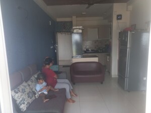 Living Room in 1 BHK Apartment at Puravankara Silversands, Mundhwa – for Rent