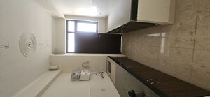 Kitchen in 2.5 BHK Apartment at Cosmos Express 99, Sector 99 – for Rent