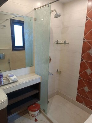 Bathroom in 4 BHK Builder Floor at Gulmohar Park – for Rent