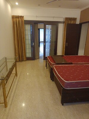 Bedroom in 4 BHK Builder Floor at Gulmohar Park – for Rent