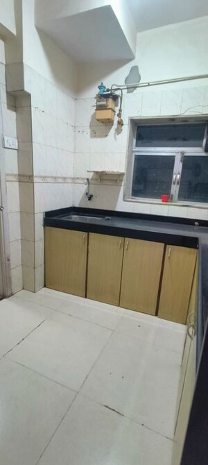Kitchen in 2 BHK Apartment at Godrej Edenwoods, Manpada – for Rent