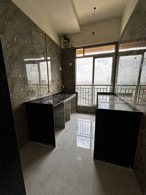 Kitchen in 2 BHK Apartment at DGS Sheetal Ekta, Malad East – for Rent