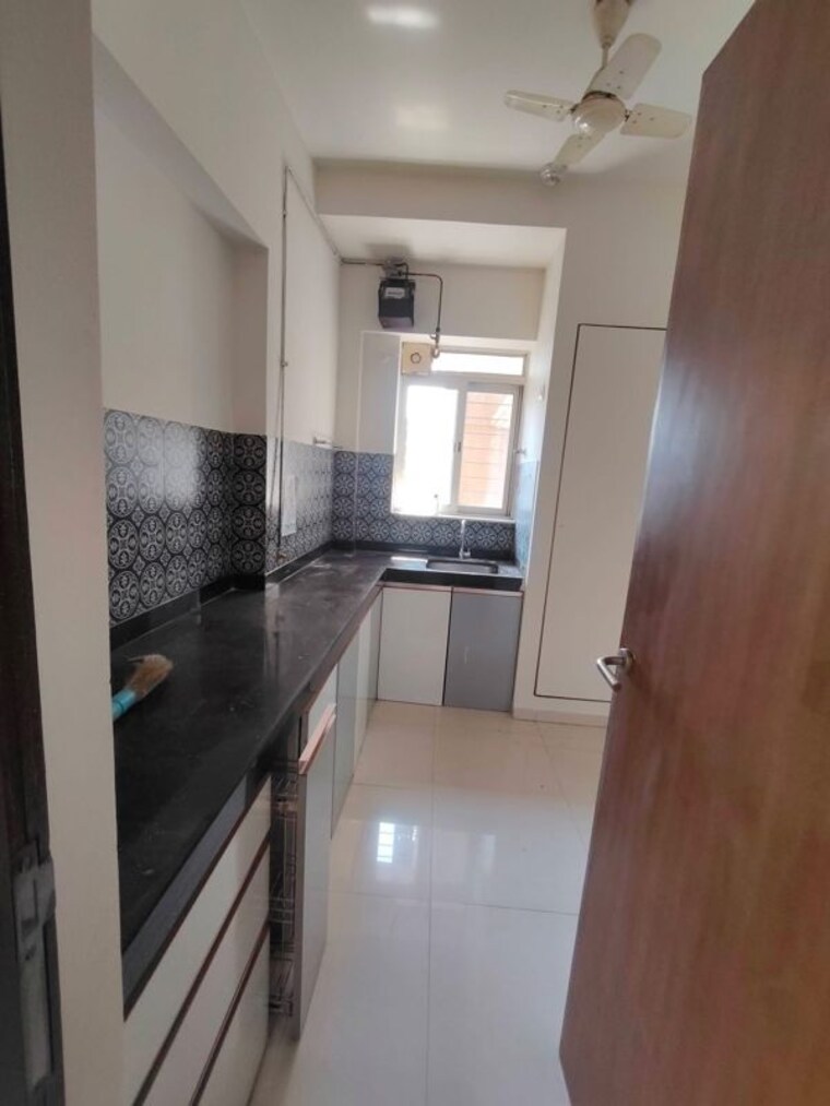 Kitchen, lodha-amara 2 Bedroom 672 Sq.Ft. Apartment In Kolshet Road Thane 10412755