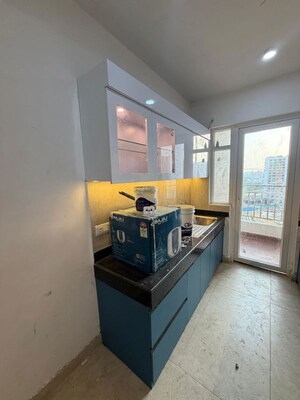 Kitchen in 2 BHK Apartment at Rishita Mulberry Heights, Sushant Golf City – for Rent