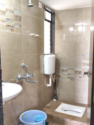 Bathroom in 1 BHK Apartment at Samarth Sai Seasons Sahara, Kalyan East – for Rent