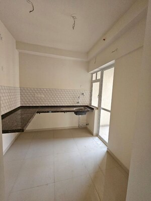 Kitchen in 2 BHK Apartment at Godrej Green Cove, Mahalunge – for Rent